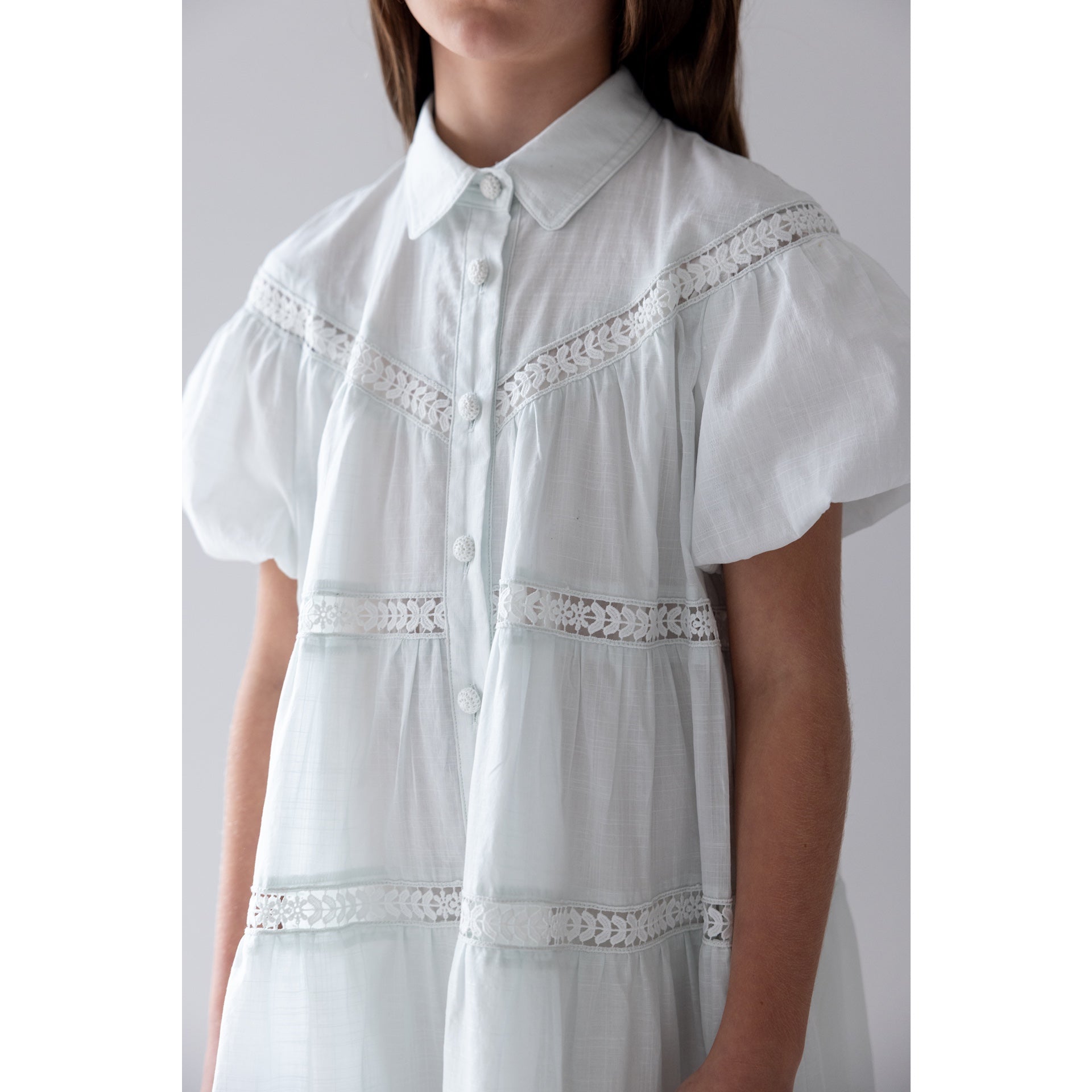 Petite Amalie Elbow Slv Whisper Blue Lace Hem Shirt Dress | Buttons Bebe Petite Amalie Elbow Slv Whisper Blue Lace Hem Shirt Dress | Buttons Bebe