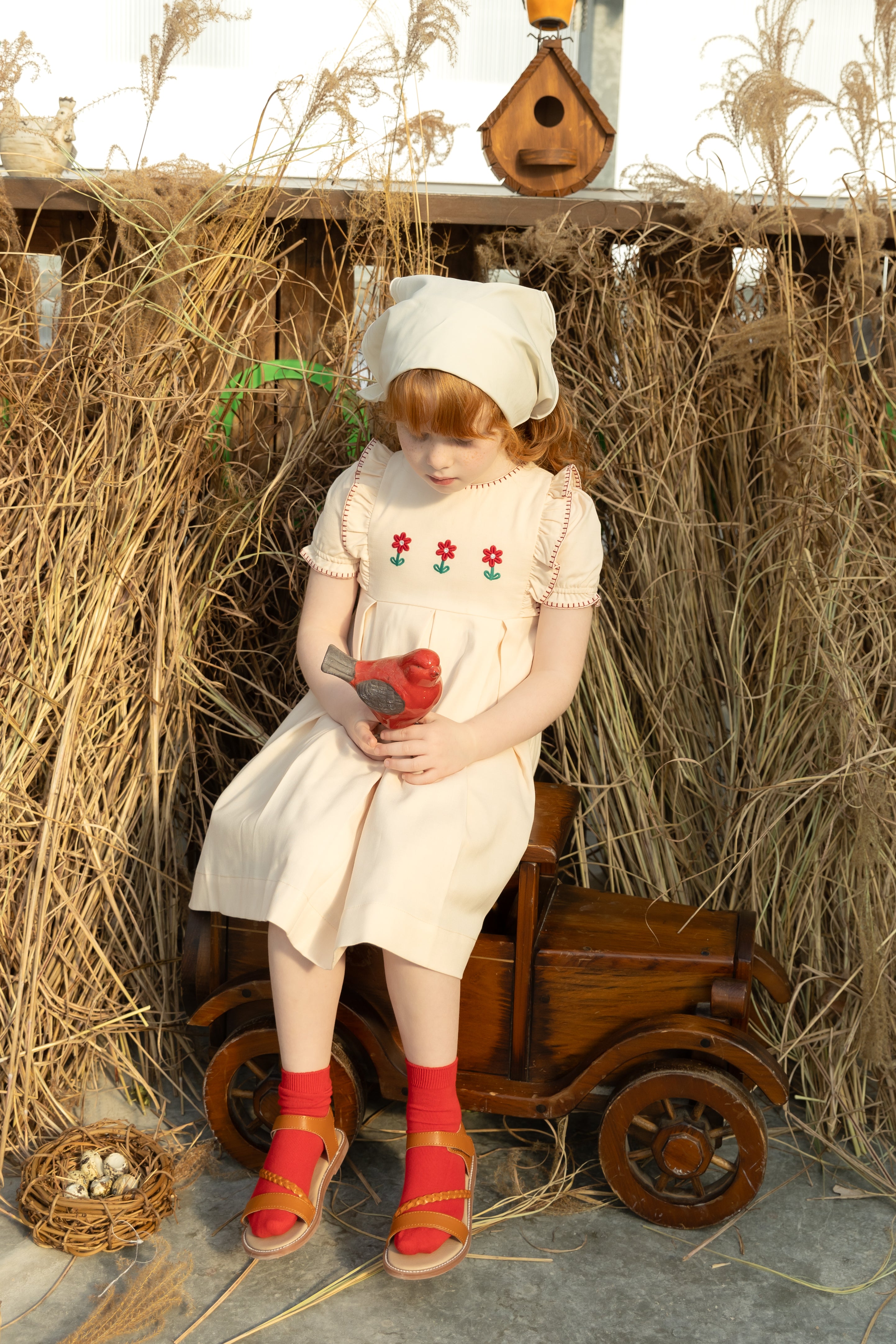 Nounelle Pleated Peach Embroidered Dress | Buttons Bebe Nounelle Pleated Peach Embroidered Dress | Buttons Bebe