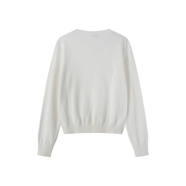 Coco Blanc Cream Chunky Crew Sweater with embossed center