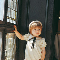 Coco Blanc Cream Romper With A Tie