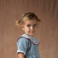 Popelin Blue romper suit with embroidered bib collar (Mod.2.3)